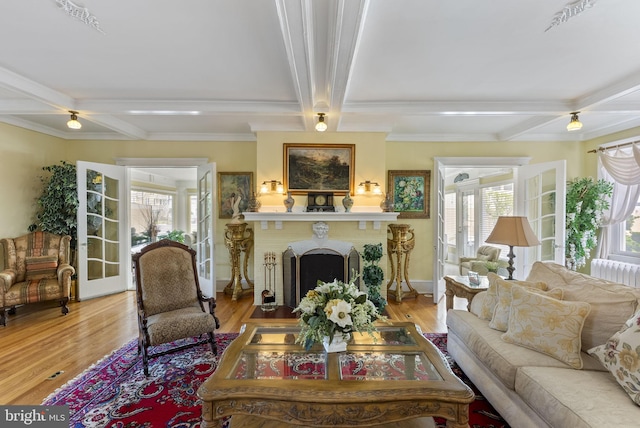 4600 Atlantic Ave, Atlantic City, NJ 08401 - living area featuring coffered ceiling, a fireplace, beam ceiling, ornamental molding, and wood finished floors