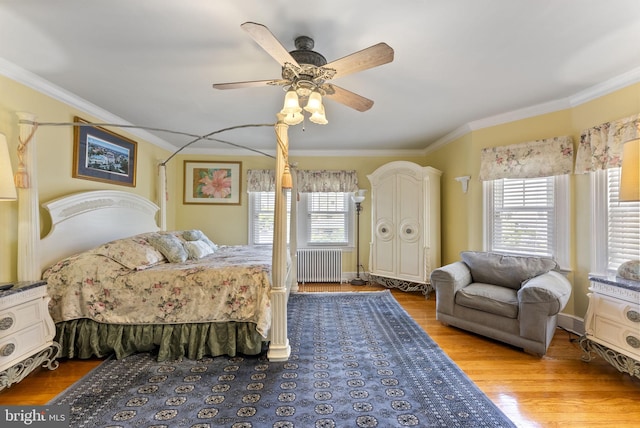 4600 Atlantic Ave, Atlantic City, NJ 08401 - bedroom featuring radiator heating unit, crown molding, wood finished floors, and a ceiling fan