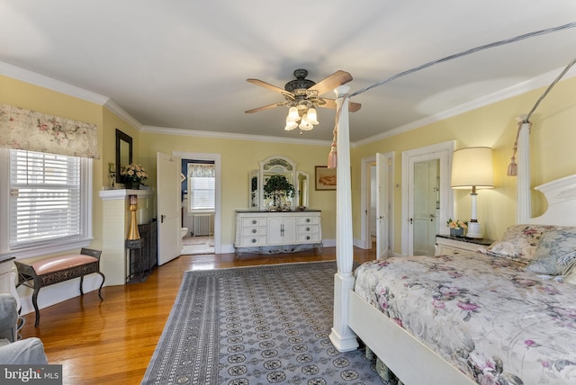 4600 Atlantic Ave, Atlantic City, NJ 08401 - bedroom with radiator heating unit, ornamental molding, wood finished floors, and a ceiling fan
