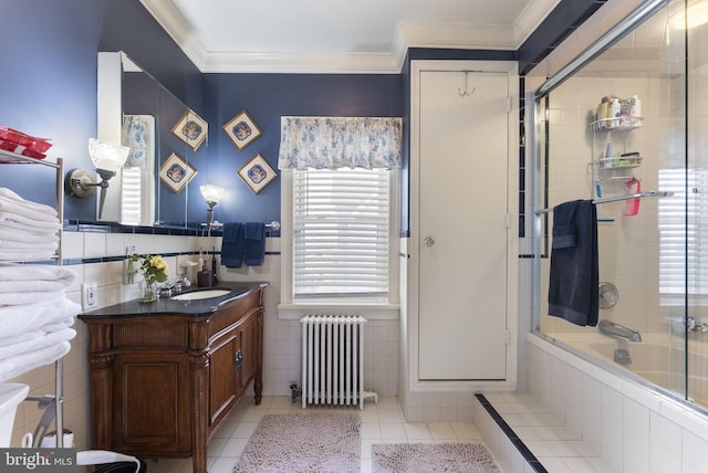 4600 Atlantic Ave, Atlantic City, NJ 08401 - bathroom featuring radiator heating unit, tile walls, vanity, tiled shower / bath combo, and tile patterned flooring