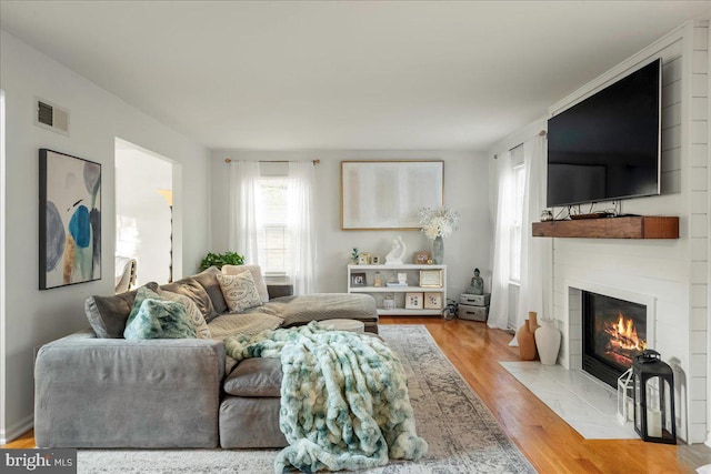 420 Highlands Blvd, Easton, PA 18042 - living room with a large fireplace and wood finished floors