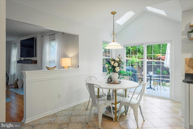 420 Highlands Blvd, Easton, PA 18042 - dining area featuring a skylight, healthy amount of natural light, vaulted ceiling, and light tile patterned floors
