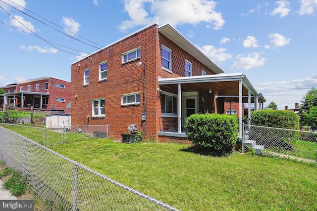 5100 12th St NE, Washington, DC 20011 - view of side of home featuring a fenced backyard and brick siding