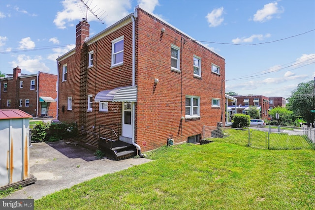 5100 12th St NE, Washington, DC 20011 - view of side of property with brick siding and a chimney