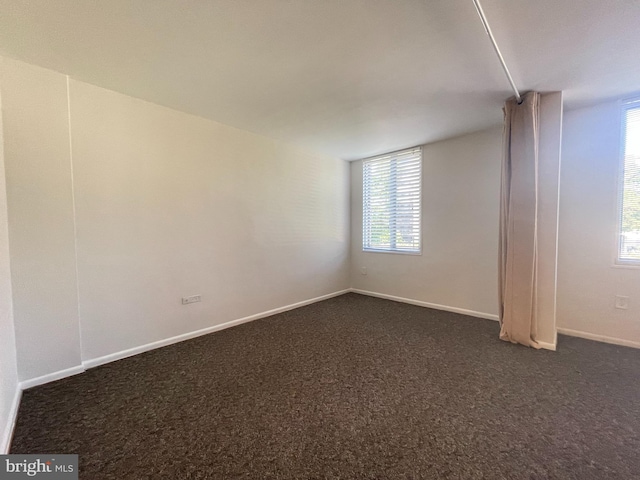 2939 Van Ness St NW Unit 743, Washington, DC 20008 - unfurnished room with dark colored carpet and baseboards
