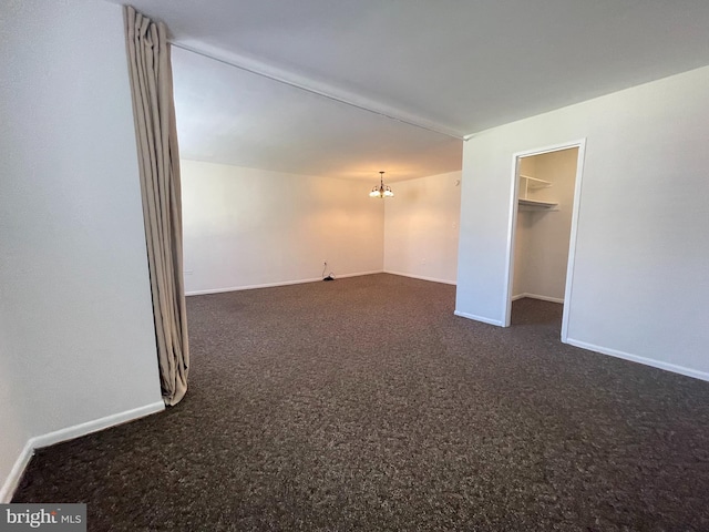 2939 Van Ness St NW Unit 743, Washington, DC 20008 - unfurnished room with dark colored carpet and a chandelier