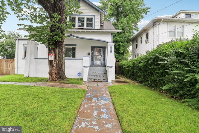 4400 Bowen Rd SE, Washington, DC 20019 - american foursquare style home with brick siding and a shingled roof