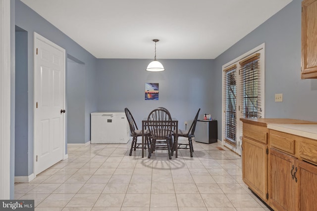 716 Euclid Ave, Lancaster, PA 17603 - dining area with light tile patterned floors and baseboards
