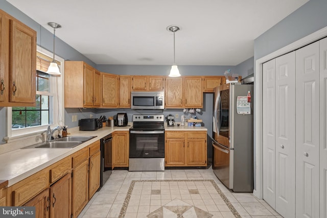 716 Euclid Ave, Lancaster, PA 17603 - kitchen with appliances with stainless steel finishes, light countertops, and decorative light fixtures