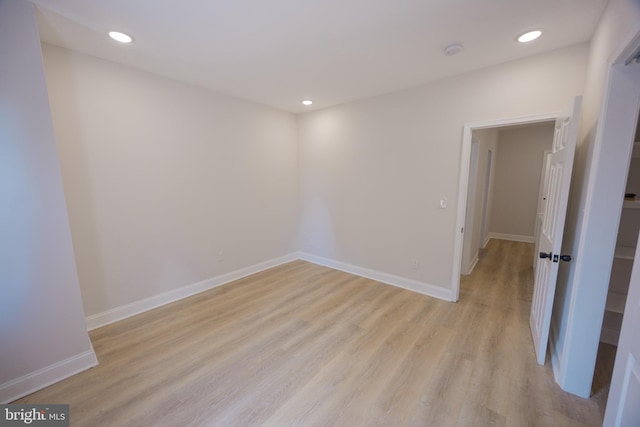 7127 Woolston Ave, Philadelphia, PA 19138 - unfurnished room with light wood-style floors, recessed lighting, and a smoke detector