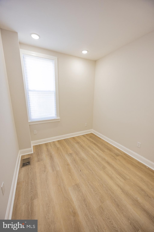 7127 Woolston Ave, Philadelphia, PA 19138 - spare room with wood finished floors and recessed lighting