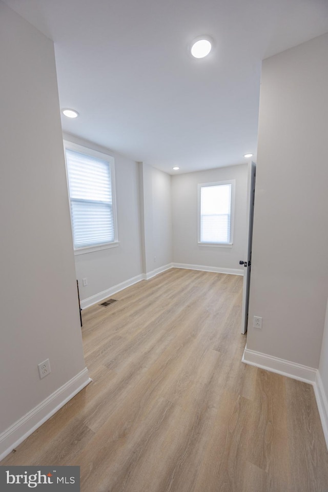 7127 Woolston Ave, Philadelphia, PA 19138 - empty room featuring light wood-style floors and recessed lighting