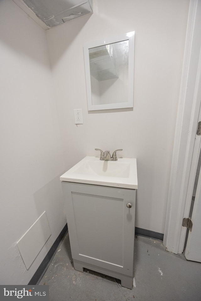 7127 Woolston Ave, Philadelphia, PA 19138 - bathroom with vanity and baseboards