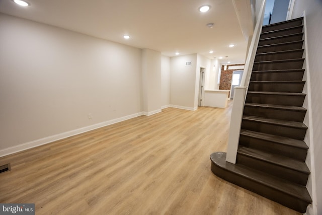 7127 Woolston Ave, Philadelphia, PA 19138 - below grade area with stairway, light wood-type flooring, and recessed lighting