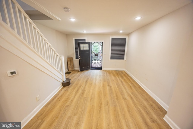 7127 Woolston Ave, Philadelphia, PA 19138 - foyer featuring stairs, light wood finished floors, and recessed lighting