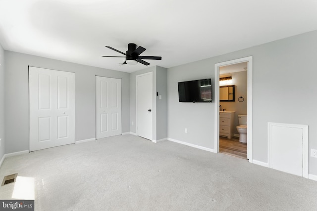 3159 Benton Square Dr, Olney, MD 20832 - unfurnished bedroom with carpet floors, two closets, ensuite bath, and ceiling fan
