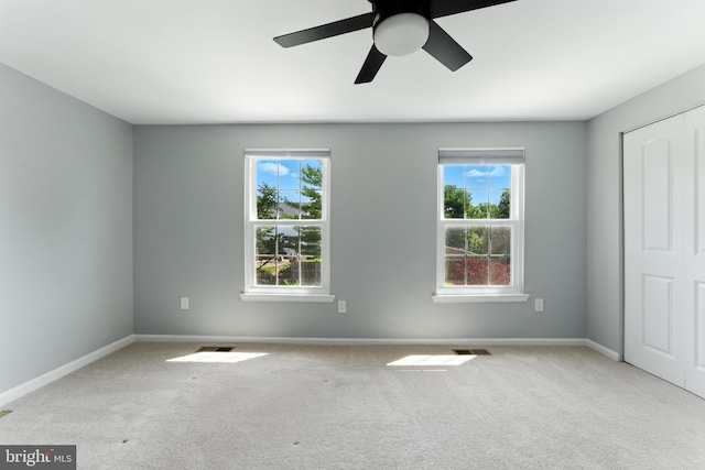 3159 Benton Square Dr, Olney, MD 20832 - unfurnished room featuring carpet, plenty of natural light, and a ceiling fan
