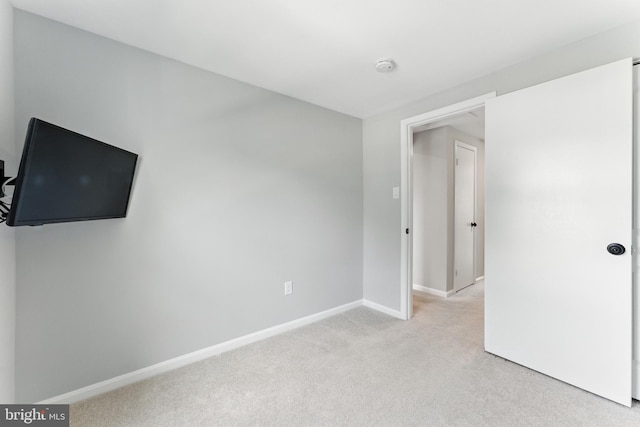 3159 Benton Square Dr, Olney, MD 20832 - unfurnished bedroom with light colored carpet and baseboards
