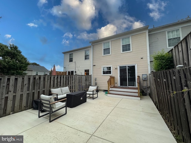 3159 Benton Square Dr, Olney, MD 20832 - rear view of house featuring outdoor lounge area, entry steps, a patio, and a fenced backyard