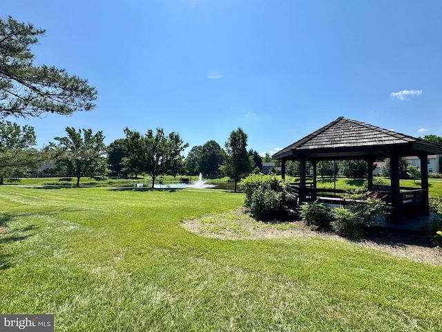 3159 Benton Square Dr, Olney, MD 20832 - view of home's community with a gazebo, a lawn, and a water view