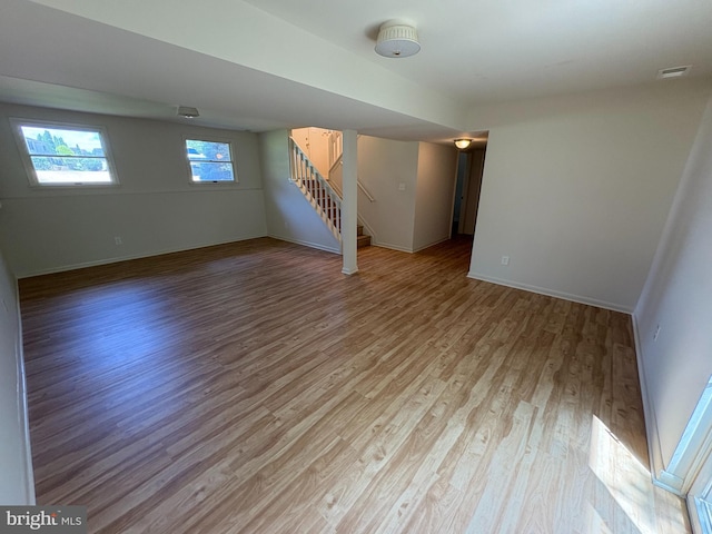 16 Carissa Ct, Owings Mills, MD 21117 - unfurnished room featuring light wood-style floors and stairs
