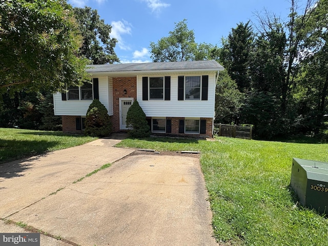 16 Carissa Ct, Owings Mills, MD 21117 - bi-level home featuring brick siding and a front yard