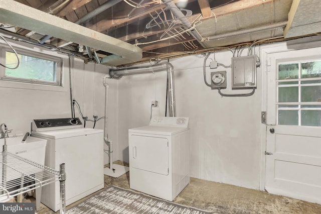 5947 Lillyan Ave, Baltimore, MD 21206 - laundry room featuring electric panel and washing machine and dryer
