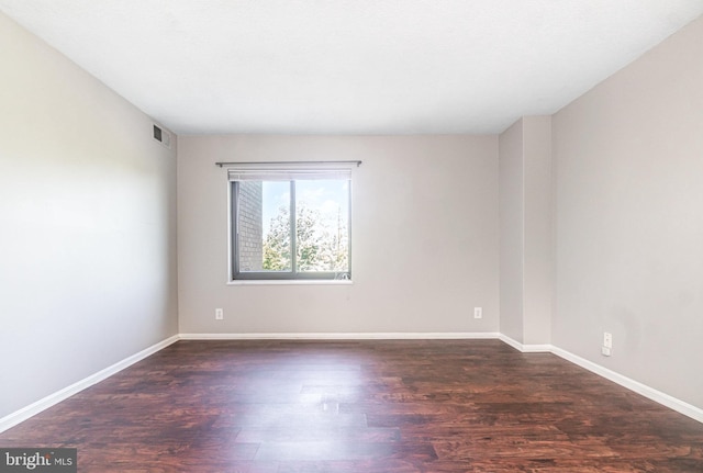 307 Yoakum Pkwy Unit 716, Alexandria, VA 22304 - spare room with dark wood-style flooring and baseboards