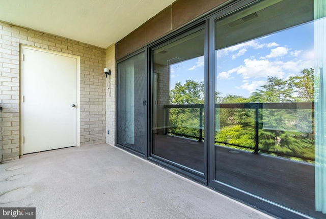 307 Yoakum Pkwy Unit 716, Alexandria, VA 22304 - property entrance featuring brick siding and a balcony
