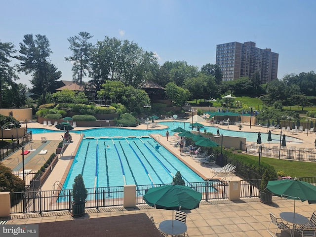 307 Yoakum Pkwy Unit 716, Alexandria, VA 22304 - community pool featuring a patio area