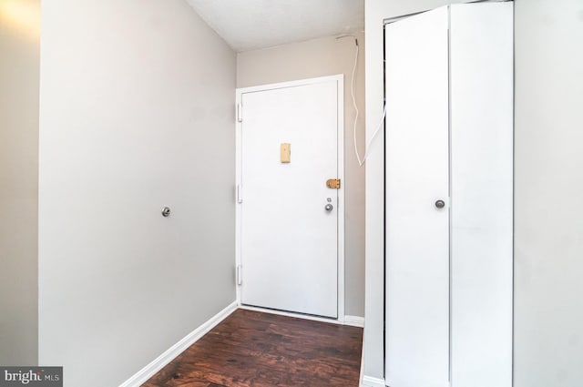 307 Yoakum Pkwy Unit 716, Alexandria, VA 22304 - doorway with dark wood-style floors and baseboards