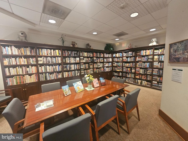 307 Yoakum Pkwy Unit 716, Alexandria, VA 22304 - office area featuring wall of books, carpet floors, and a paneled ceiling