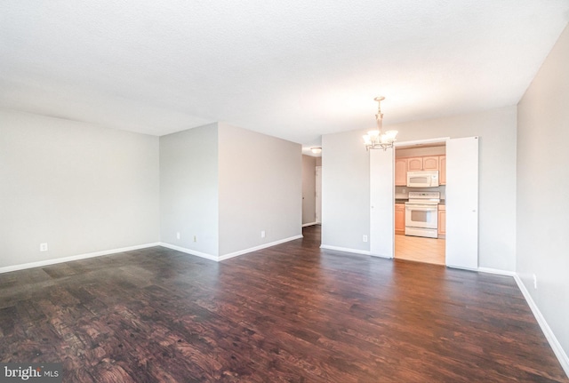 307 Yoakum Pkwy Unit 716, Alexandria, VA 22304 - unfurnished living room with a chandelier and dark wood finished floors