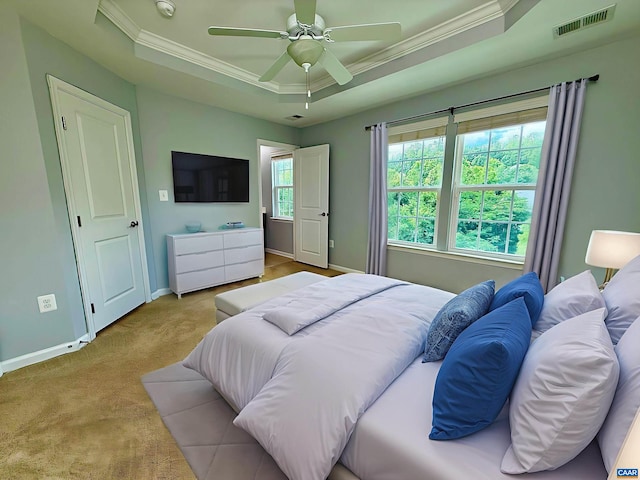 2176 Whispering Hollow Ln, Charlottesville, VA 22911 - bedroom with a tray ceiling, ornamental molding, carpet flooring, and a ceiling fan