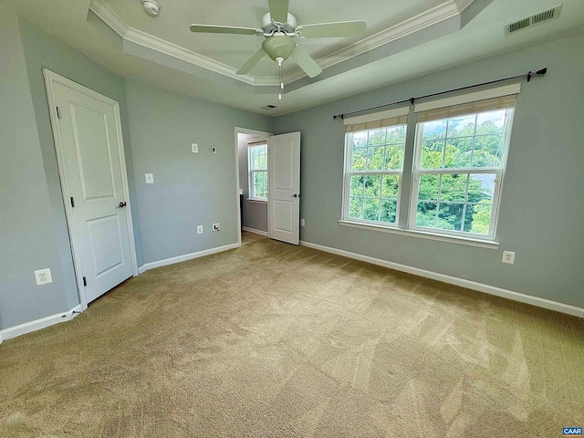 2176 Whispering Hollow Ln, Charlottesville, VA 22911 - empty room with a raised ceiling, crown molding, carpet flooring, ceiling fan, and a smoke detector