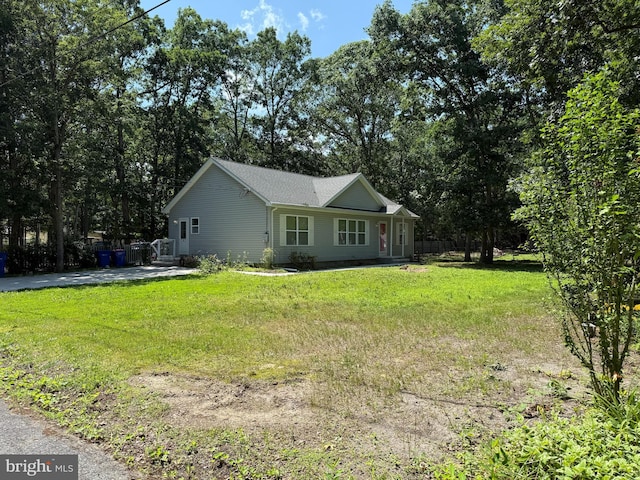 2 Laurel Dr, Millville, NJ 08332 - view of home's exterior with a lawn and view of scattered trees