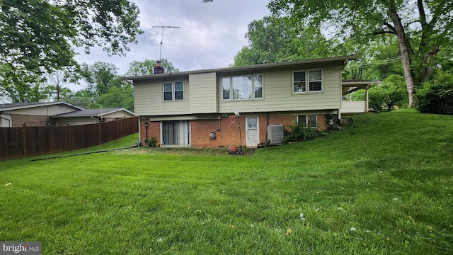 12912 Middlevale Ln, Silver Spring, MD 20906 - rear view of house with a chimney and brick siding