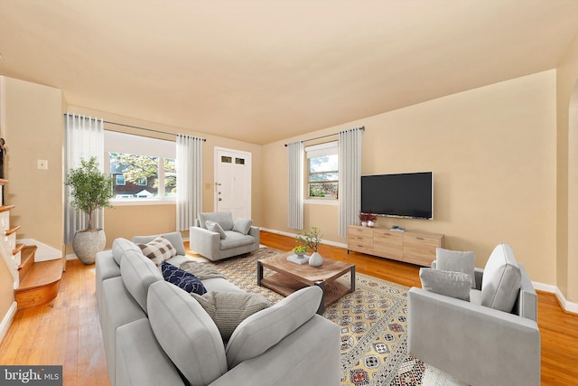 11944 Andrew St, Silver Spring, MD 20902 - living room featuring healthy amount of natural light and wood finished floors