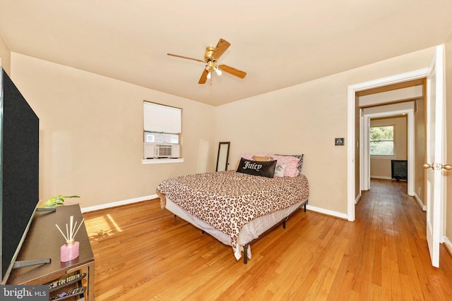 11944 Andrew St, Silver Spring, MD 20902 - bedroom with light wood-style flooring, cooling unit, and a ceiling fan