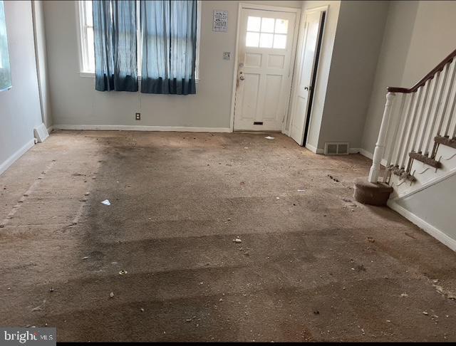 6530 Algard St, Philadelphia, PA 19135 - entryway featuring stairs and plenty of natural light