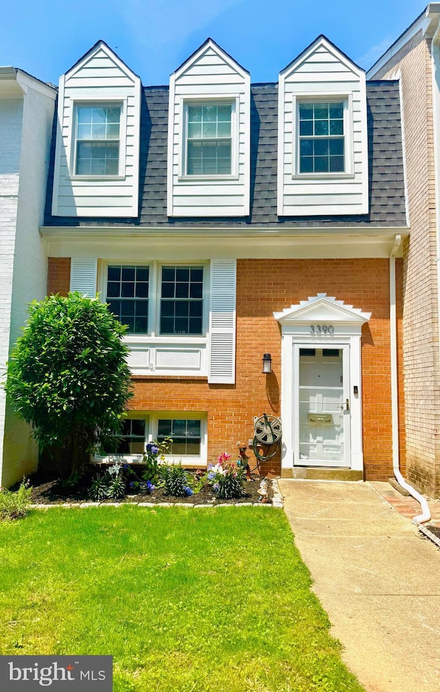 3390 Whipple Ct, Annandale, VA 22003 - view of front of home featuring brick siding, a front yard, and a shingled roof
