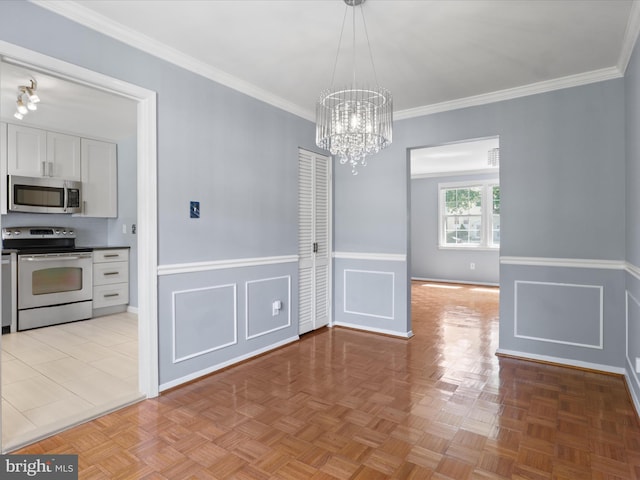 3390 Whipple Ct, Annandale, VA 22003 - unfurnished dining area with a chandelier, crown molding, and wainscoting