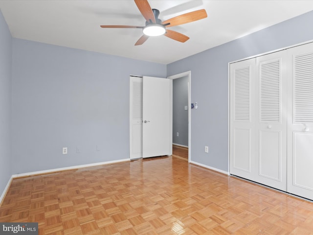 3390 Whipple Ct, Annandale, VA 22003 - unfurnished bedroom featuring multiple closets and a ceiling fan