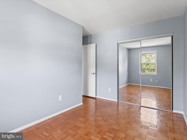 3390 Whipple Ct, Annandale, VA 22003 - unfurnished bedroom featuring baseboards and a closet