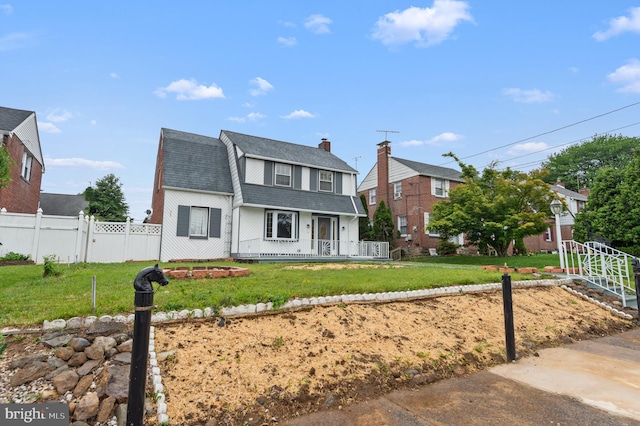 1112 Serrill Ave, Lansdowne, PA 19050 - view of front facade featuring a porch, roof with shingles, and a chimney