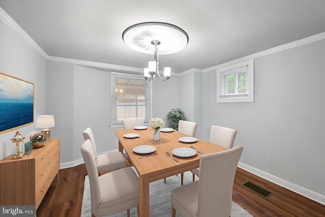 1112 Serrill Ave, Lansdowne, PA 19050 - dining area featuring a chandelier, crown molding, and wood finished floors