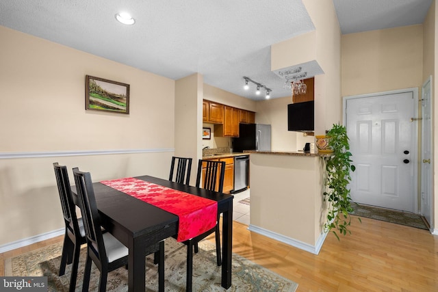 1533 Lincoln Way Unit 301A, Mclean, VA 22102 - dining area with light wood-style floors and baseboards