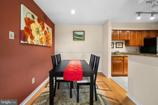 1533 Lincoln Way Unit 301A, Mclean, VA 22102 - dining space featuring light wood finished floors and recessed lighting