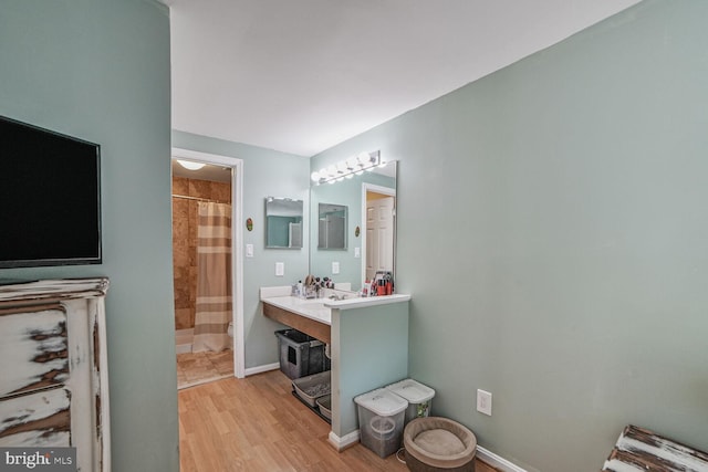 19901 Drexel Hill Cir, Gaithersburg, MD 20886 - bathroom with a shower with curtain, vanity, and wood finished floors