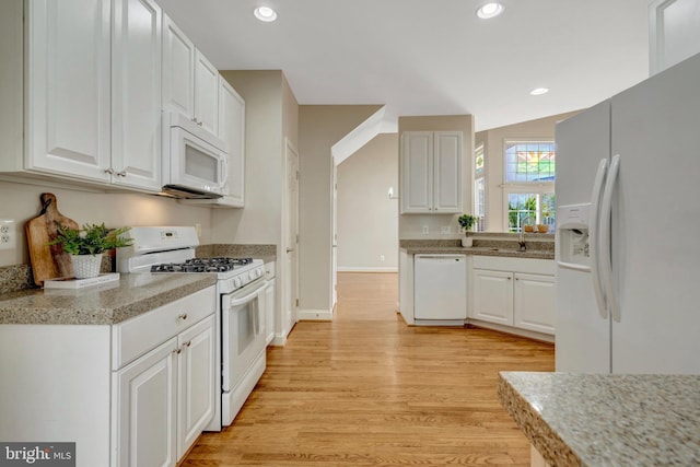 13854 Cinch Ln, Gainesville, VA 20155 - kitchen featuring white appliances, light wood-type flooring, white cabinetry, light countertops, and recessed lighting